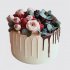 Белый торт для двоих именинников с цветами и ягодами №108404