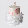 Праздничный торт на юбилей 50 лет с шарами из мастики с девушкой в юбке №110340