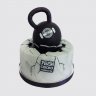 Черный торт в форме гири на День Рождения папули №111347
