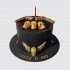Черный торт на ДР с золотыми черепами и пистолетом №111784