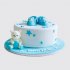 Белый торт на выписку для мальчика с пинетками для малыша №114170