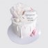 Белый торт для девочки на крещение с цветком и макарунами №114194