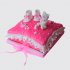 Торт в форме подушки с пинетками и мишкой из мастики №114321